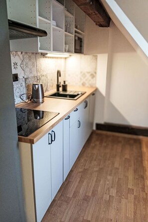 Fridge, microwave, cookware/dishes/utensils