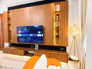 Comfort Apartment, Balcony, City View | Living area | Flat-screen TV - Ivys Cozy Homes Kampala (Kampala)