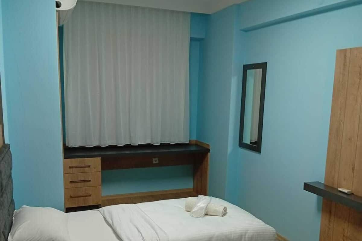 Desk, laptop workspace, free WiFi, bed sheets