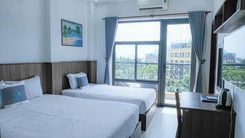 Habitación triple superior | Wifi gratis y ropa de cama