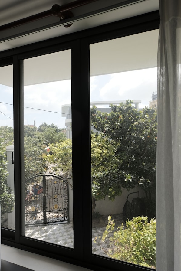 Camera Basic con 2 letti singoli, vista giardino | Wi-Fi gratuito, lenzuola