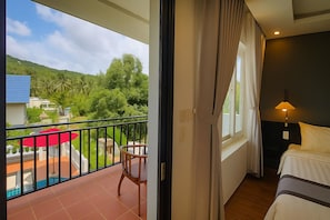 Superior Double Room, Pool View | Terrace/patio - Sunset Hill Resort Phu Quoc (Phu Quoc)