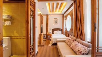 Familie driepersoonskamer, niet-roken, uitzicht op tuin | Gratis wifi