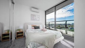 2 habitaciones, tabla de planchar con plancha, wifi y ropa de cama