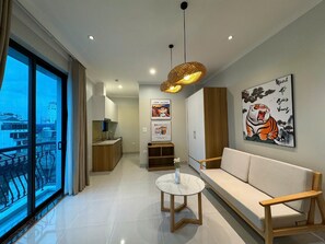 Deluxe Double or Twin Room, 1 Bedroom, Balcony, City View | Private kitchenette | Mini-fridge, microwave, stovetop, cookware/dishes/utensils - Hanique Cafe and Stay (Hanoi)