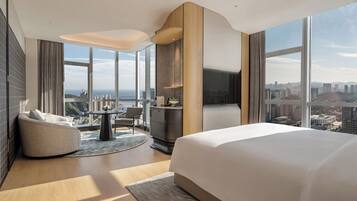 Premier Suite, Sea View | Living area | 43-inch TV with cable channels