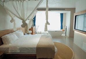 Standard Double Room, Courtyard View | Living area | TV - TANG House (Wanning)