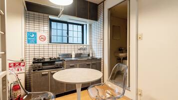 Fridge, microwave, stovetop, cookware/dishes/utensils