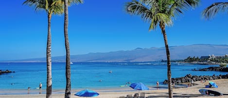 On the beach, sun-loungers, beach towels