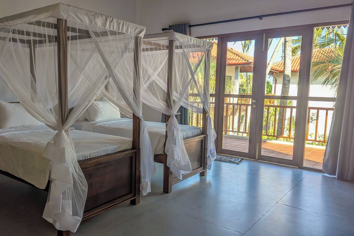 Deluxe Double or Twin Room, Balcony, Sea View | In-room safe, desk, laptop workspace, iron/ironing board