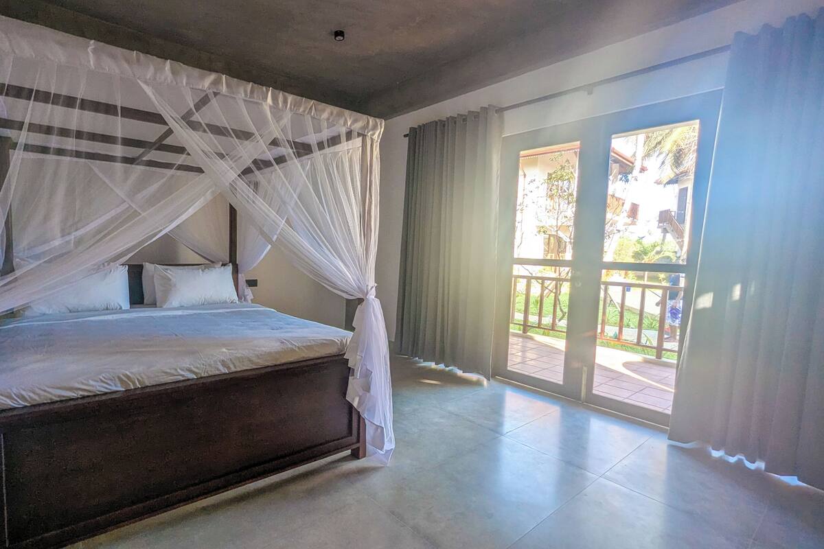 Deluxe Double Room, Balcony, Sea View | In-room safe, desk, laptop workspace, iron/ironing board