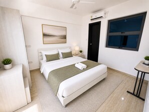2 habitaciones, tabla de planchar con plancha, wifi y ropa de cama 
