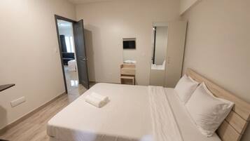 2 dormitorios, tabla de planchar con plancha, wifi y ropa de cama