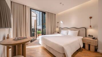 Executive Studio, Balcony, City View | Minibar, in-room safe, blackout drapes, free WiFi