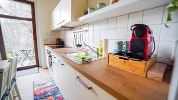 Fridge, stovetop, cookware/dishes/utensils