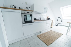 Réfrigérateur, four, plaque de cuisson, lave-vaisselle