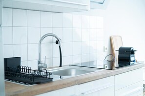 Kylskåp, ugn, spishäll och diskmaskin