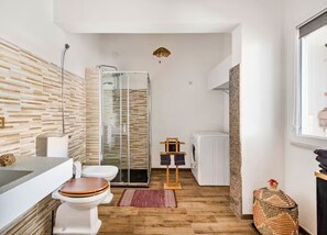 Shower, bidet, towels, soap