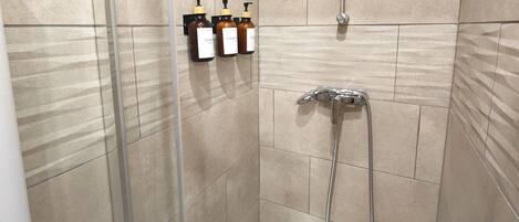 Hair dryer, towels, soap, shampoo
