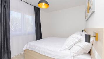 Apartemen (A1) | Brankas, setrika/meja setrika, dan Wi-Fi gratis