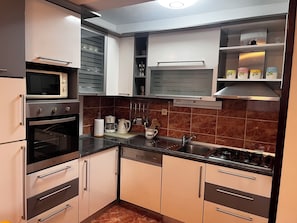 Apartment (A3) | Private kitchen | Fridge, microwave, oven, stovetop - Apartments Neda (Rogoznica)