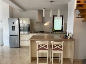Apartment (A1) | Private kitchen | Fridge, microwave, oven, stovetop - Apartment Lucille (Kali)