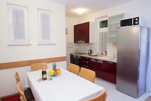 Apartment (A1) | Private kitchen | Fridge, microwave, oven, dishwasher - Apartment XXL Apartments (Split)