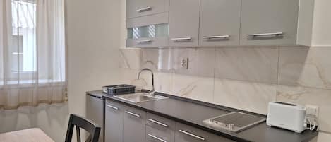 Apartment (A1) | Private kitchen | Fridge, stovetop, toaster, cookware/dishes/utensils