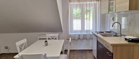 Apartment (A2) | Private kitchen | Fridge, stovetop, toaster, cookware/dishes/utensils