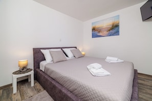 Apartamento (A1) | Ferros/tábuas de passar roupa, berços grátis, Wi-Fi de cortesia