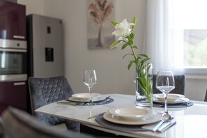 Apartment (A1) | Private kitchen | Fridge, oven, stovetop, dishwasher - Apartment Adria (Trogir)