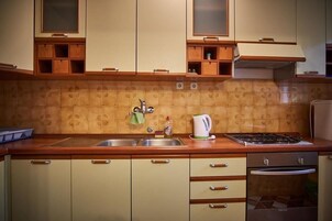 Apartment (A1) | Private kitchen | Fridge, stovetop, espresso maker, cookware/dishes/utensils