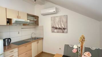 Apartment (A3) | Private kitchen | Fridge, microwave, stovetop, espresso maker