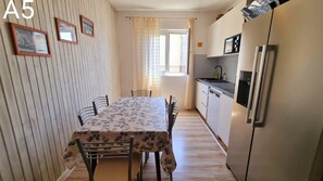 Apartment (A5) | Private kitchen - Apartments Tiho (Podgora)