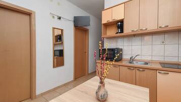 Apartment (A4) | Private kitchen | Fridge, oven, stovetop, espresso maker