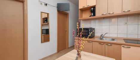 Apartment (A4) | Private kitchen | Fridge, oven, stovetop, espresso maker