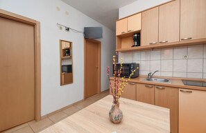 Apartment (A4) | Private kitchen | Fridge, oven, stovetop, espresso maker - Apartments Toni (Solta)