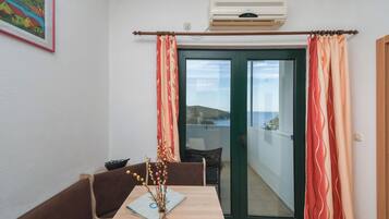 Apartamento (A4) | Cozinha privada | Geladeira, fogão, cooktop, máquina de café expresso