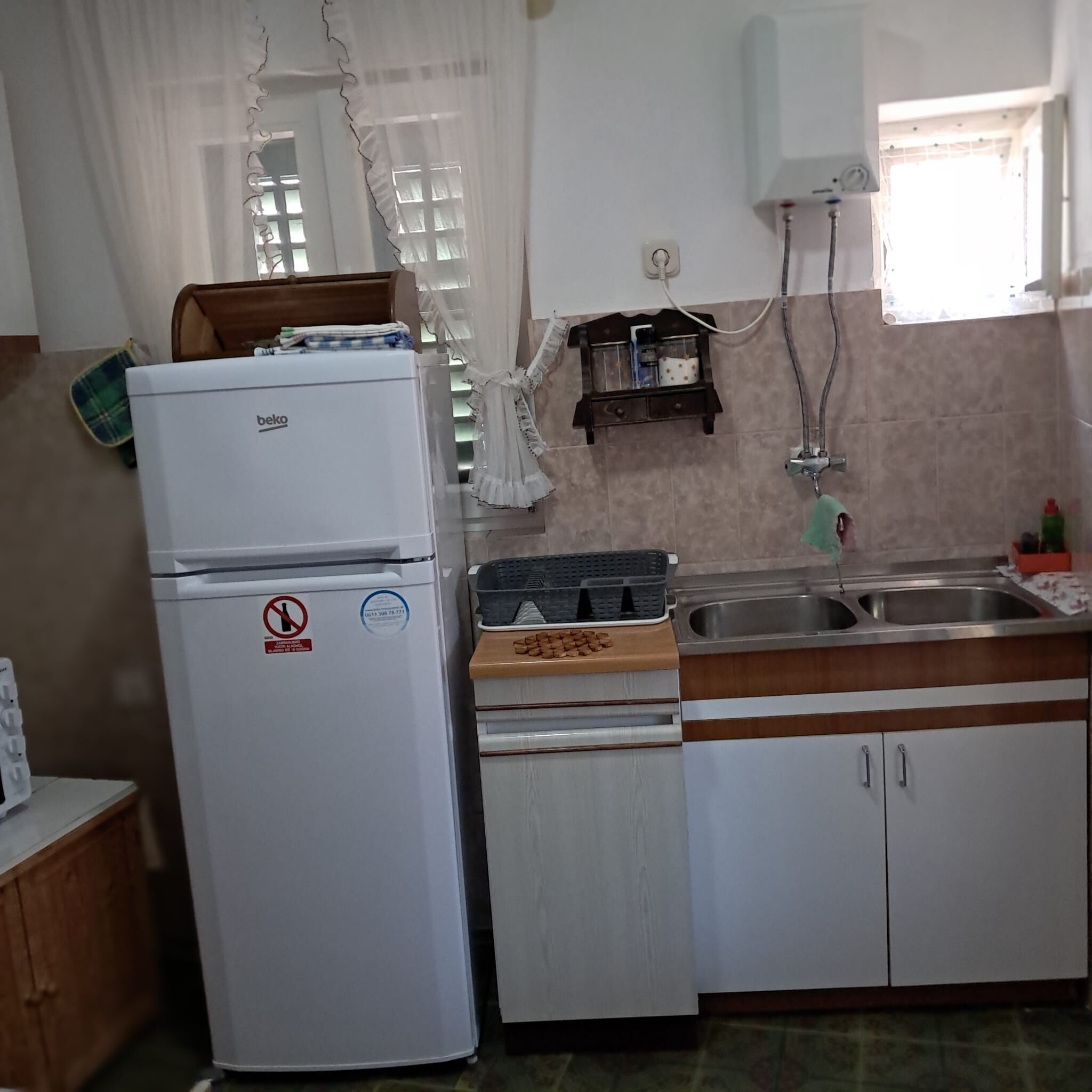 Departamento (A2) | Cocina privada | Refrigerador, horno, parrilla de estufa y tostadora 