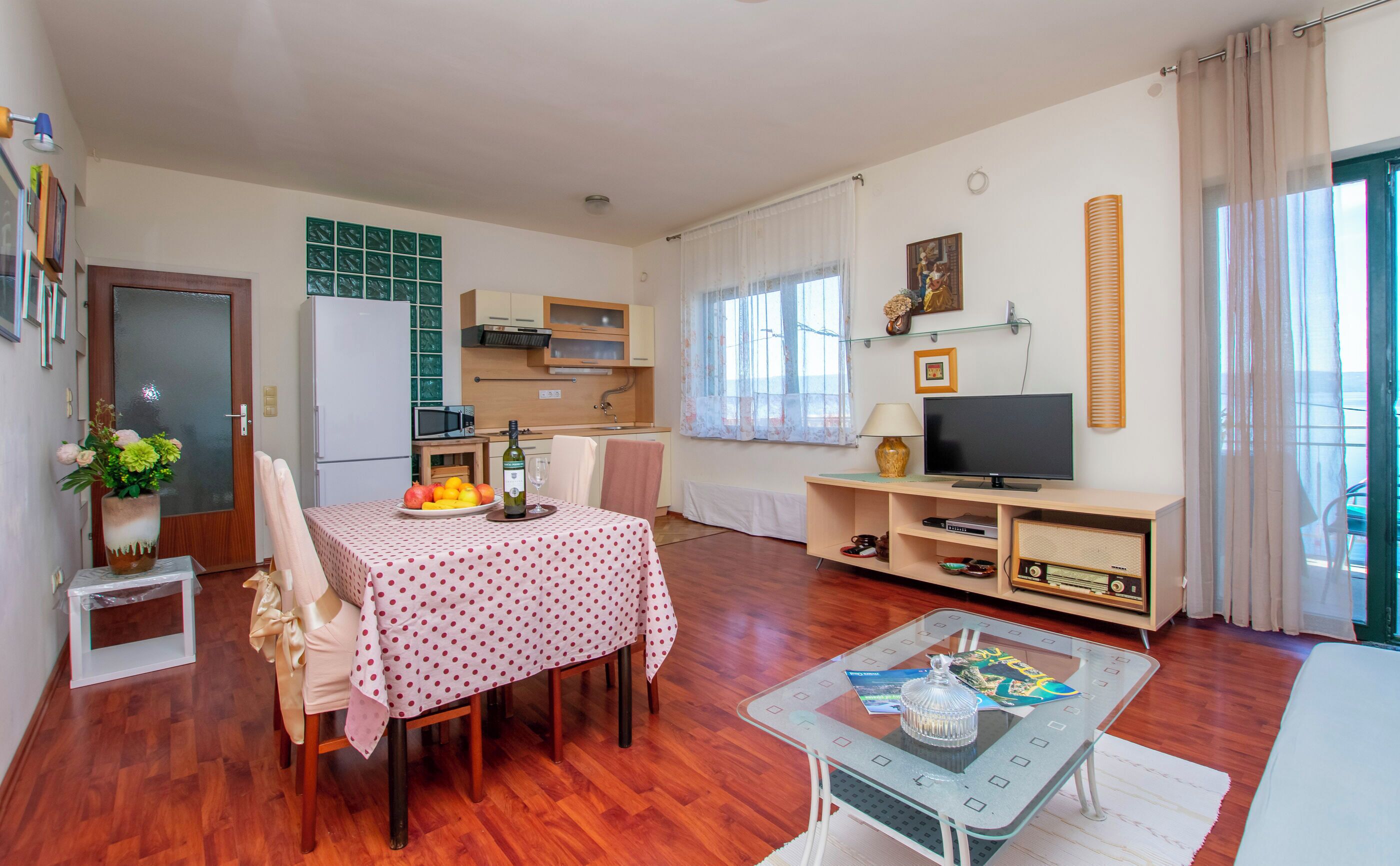 Apartment (A1) | Private kitchen | Fridge, microwave, stovetop, dishwasher