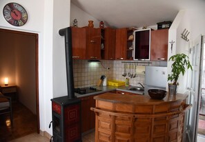 Appartement (A3) | Cuisine privée | Réfrigérateur, plaque de cuisson, machine à expresso