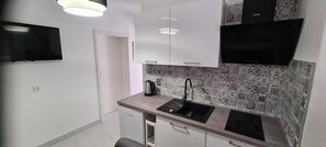 Appartement (A1) | Cuisine privée | Réfrigérateur, four, plaque de cuisson