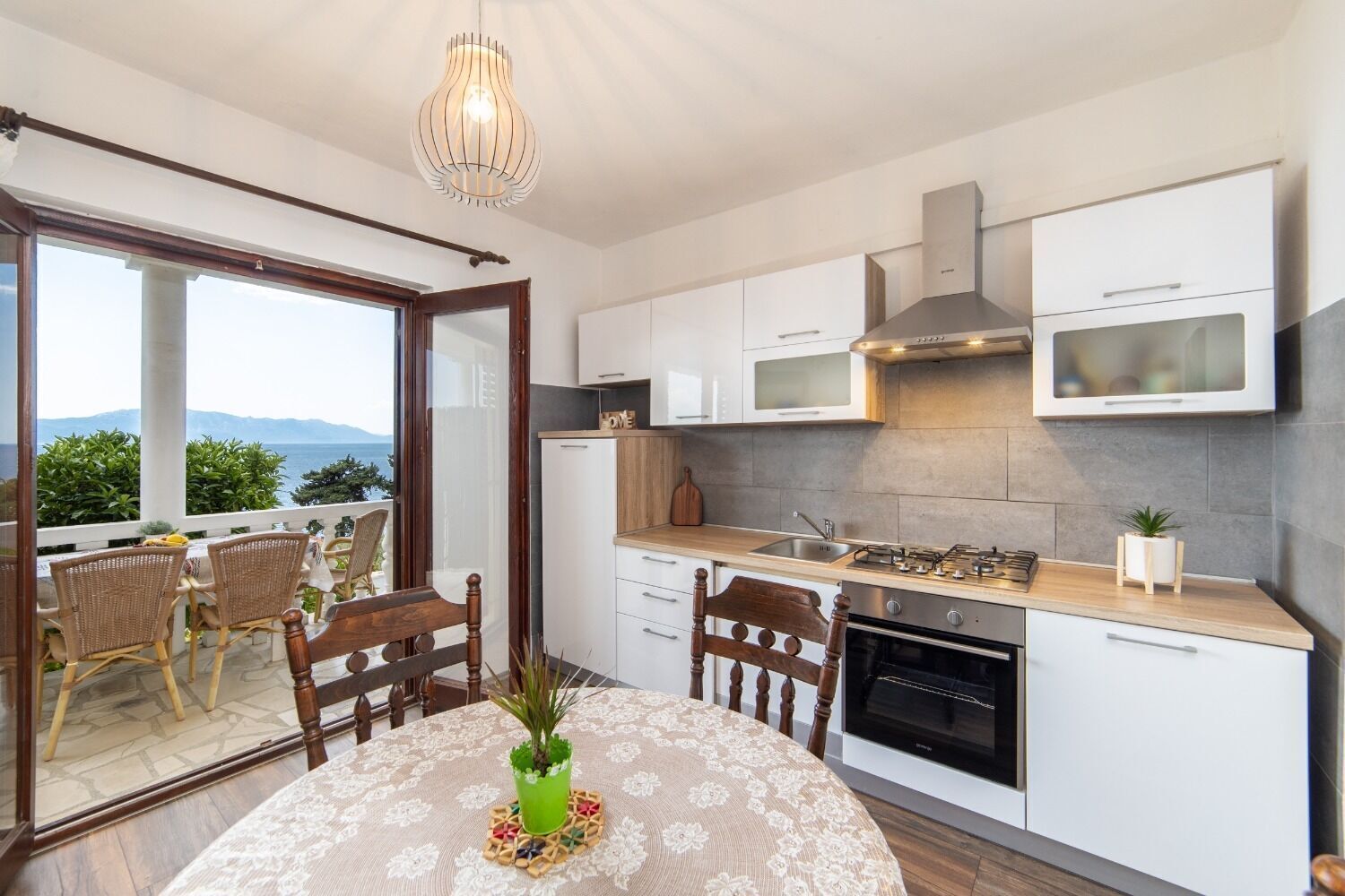 Apartamento (A2) | Cozinha privada | Geladeira, cooktop, talheres/pratos/utensílios de cozinha