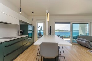 Apartment (A2) | Private kitchen | Fridge, microwave, oven, stovetop - Apartments Adriatic (Vodice)