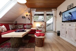 Smart-tv, dvd-spelare och böcker