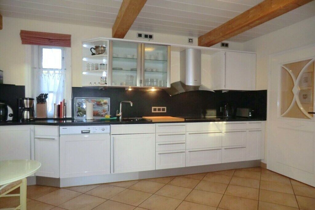 Fridge, oven, stovetop, dining tables