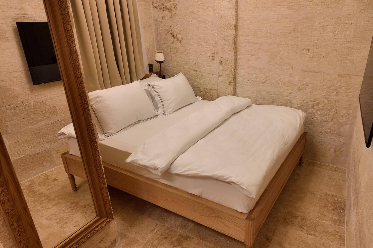 Economy Room | Ropa de cama de alta calidad, minibar, sistema de insonorización