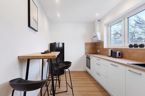 Kylskåp, ugn, spishäll och diskmaskin