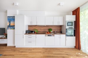 100-centimeters smart-tv med digitale kanaler, gulvvarme