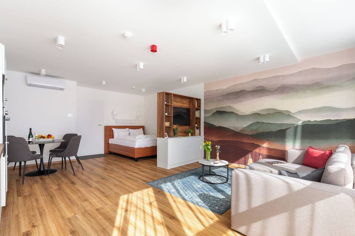 Premium Studio, 1 King Bed with Sofa bed, City View | Living area | 100-cm Smart TV with digital channels, heated floors, streaming services